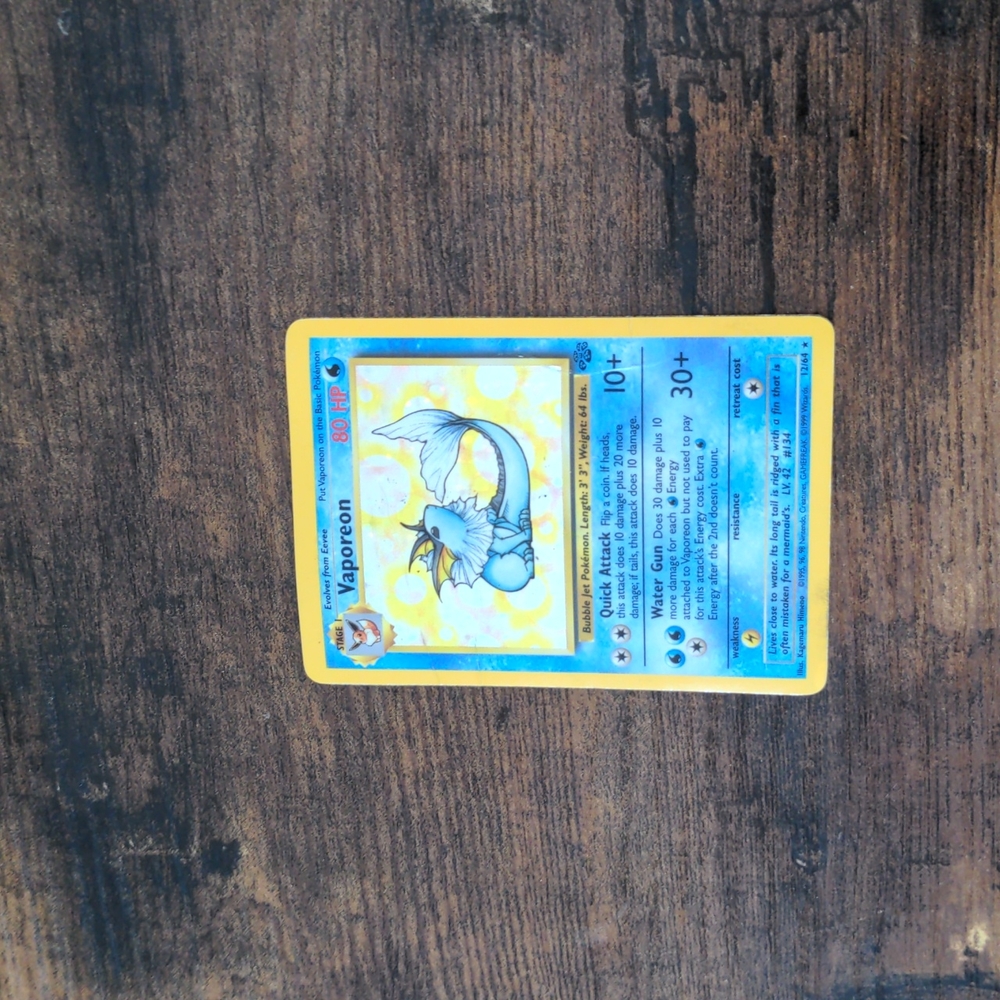 1999 Pokemon card holo vaporeon